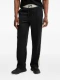 GUESS USA side-stripe track pants - Black