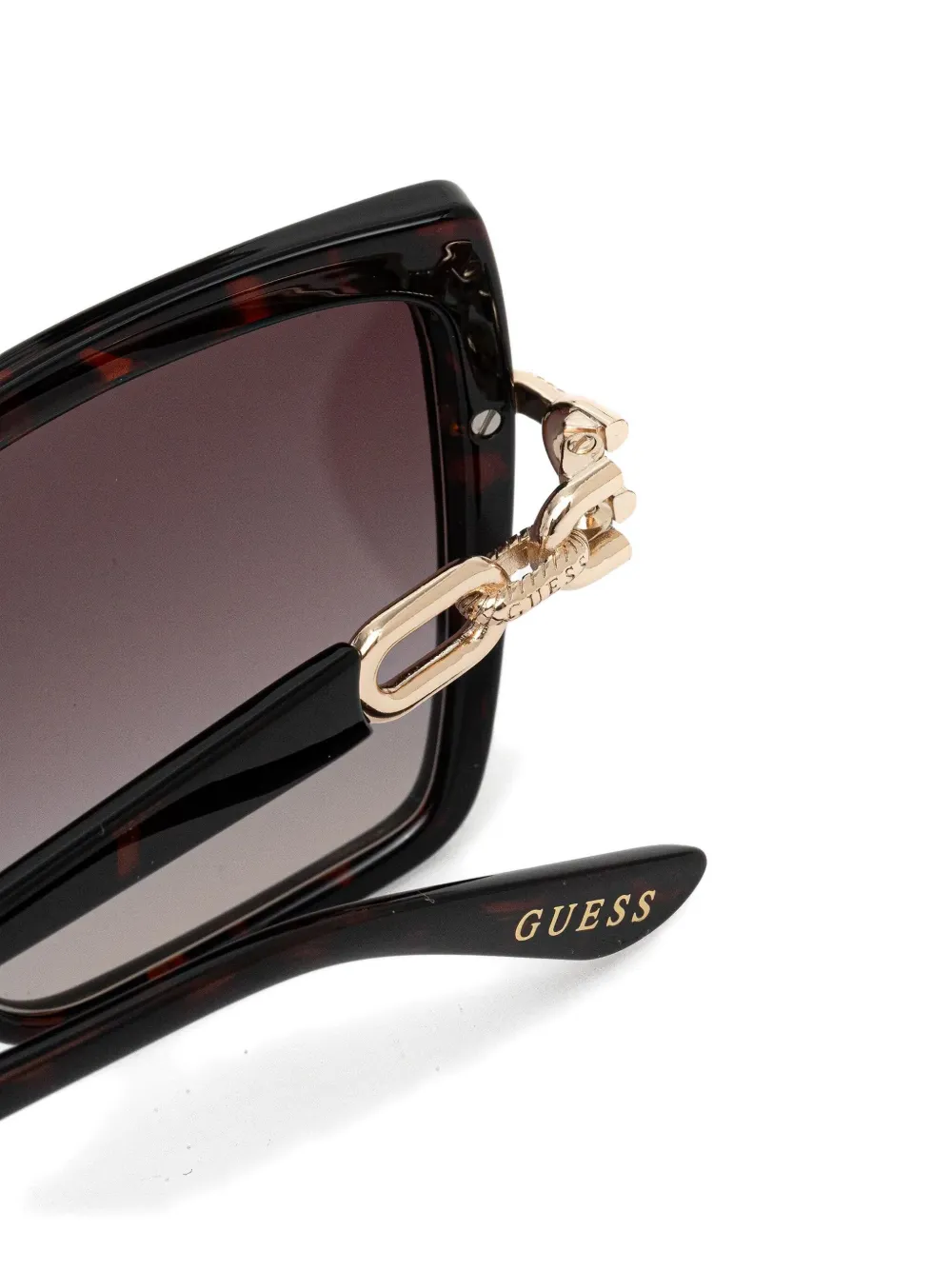 GUESS EYEWEAR Zonnebril met schildpadschild-design en geometrisch montuur Bruin