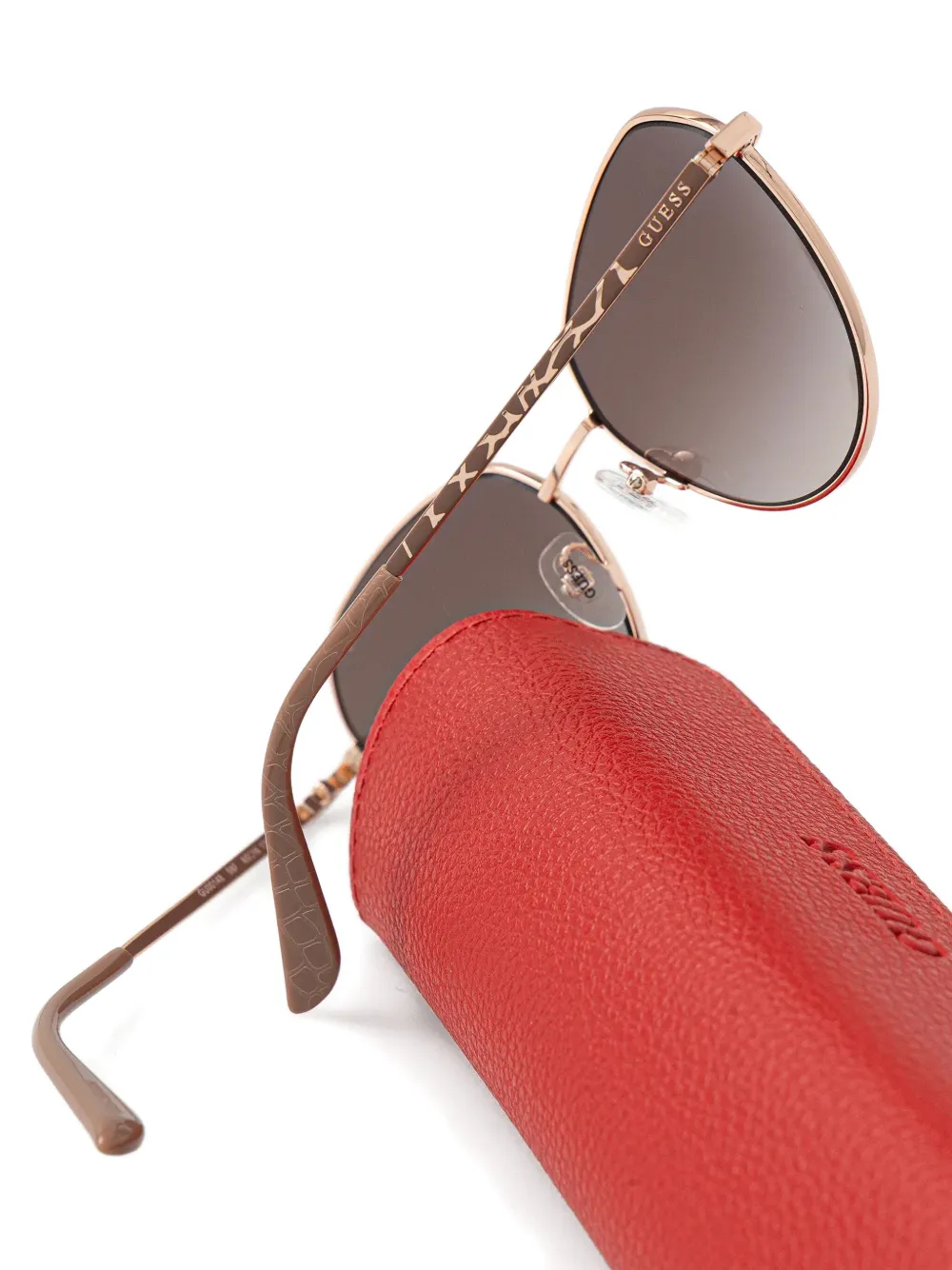 GUESS EYEWEAR Zonnebril met ovaal montuur Roze