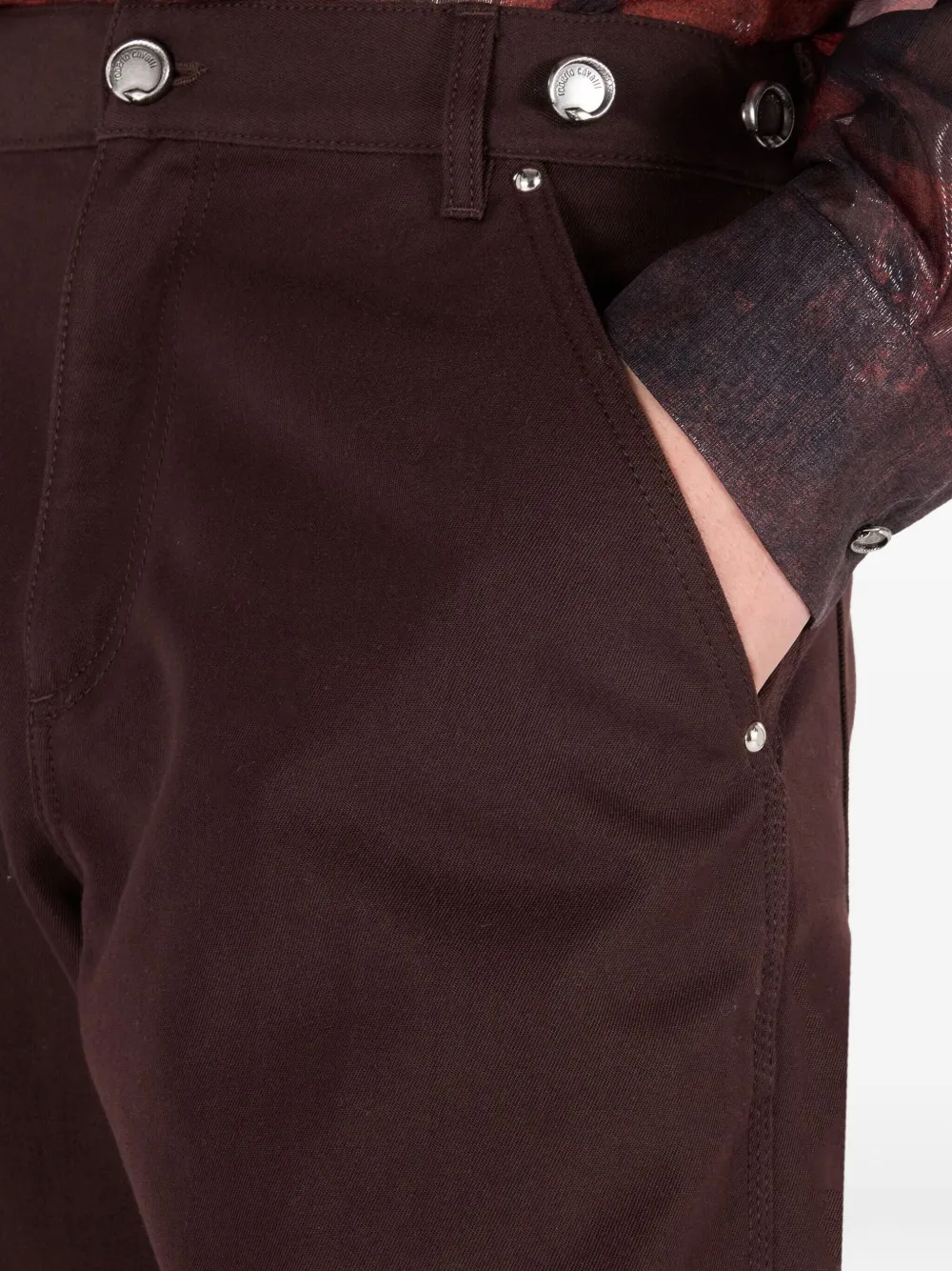 button-fastening pocket trousers