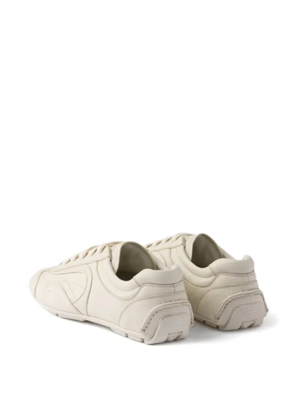 Prada logo-patch Leather Sneakers | Neutrals | FARFETCH
