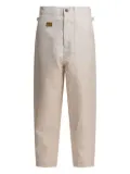 KAPITAL logo-patch trousers - Light and natural