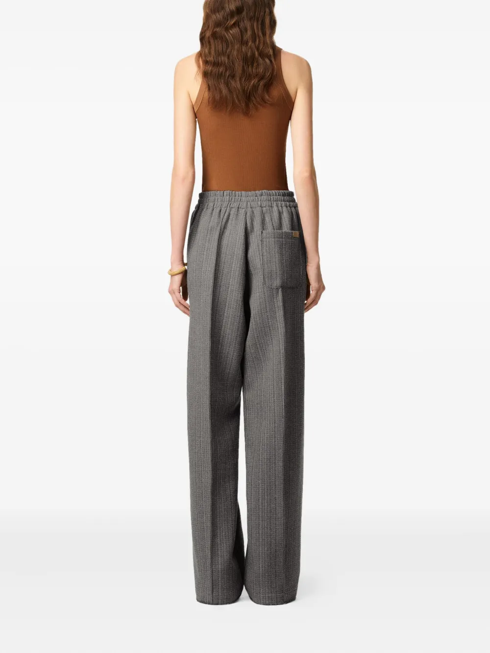 AMI Paris Elastische broek met visgraatpatroon Bruin