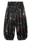 Comme Des Garçons Comme Des Garçons floral-print trousers - Black