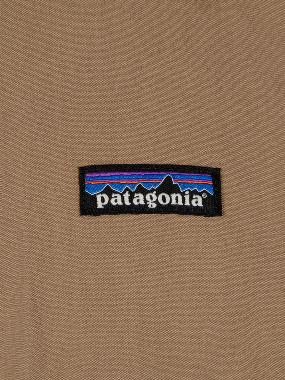 Patagonia M's Nomader jack met logopatch en rits Bruin