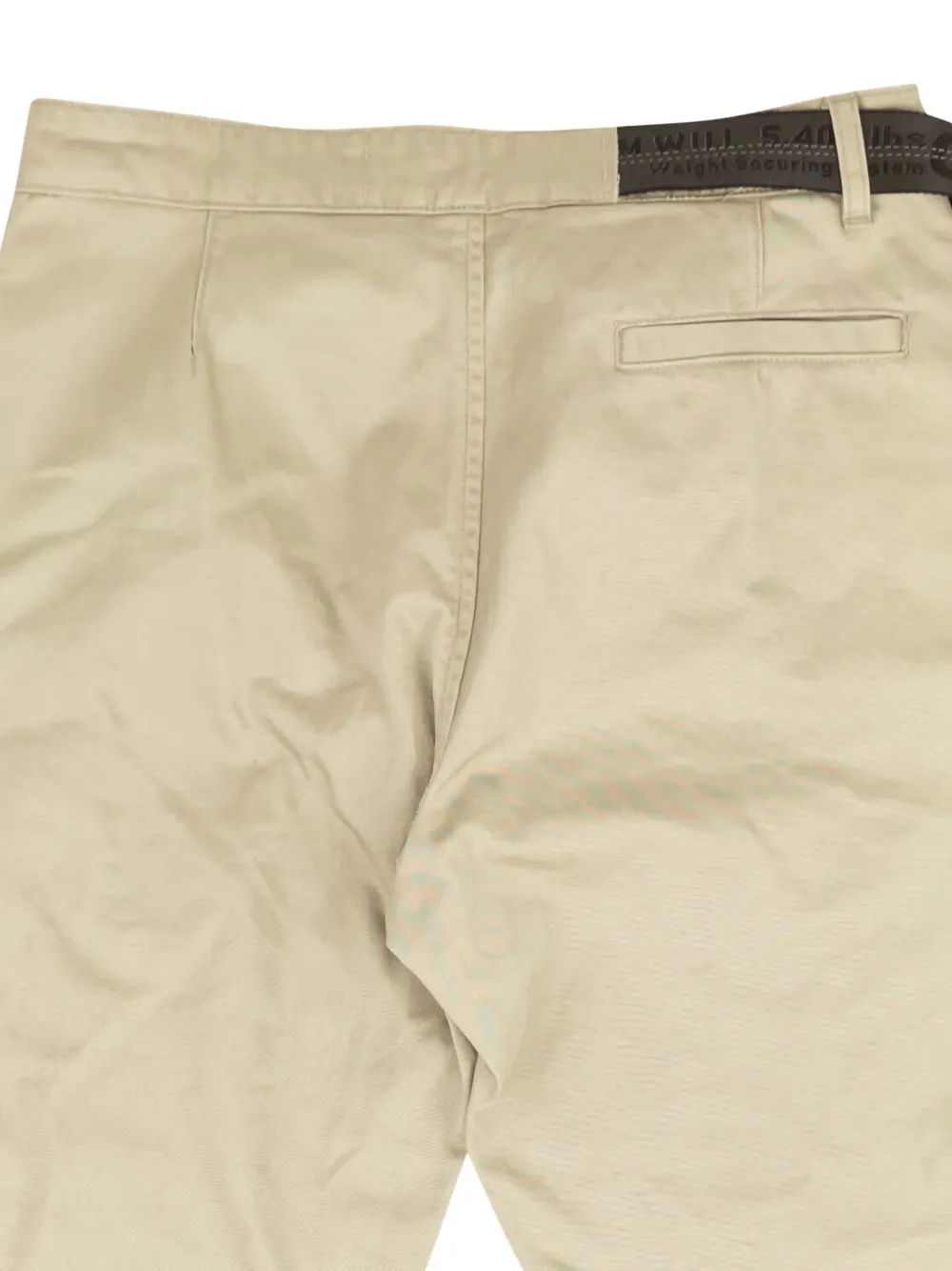 Off-White Jeans met toelopende pijpen en ceintuur Beige
