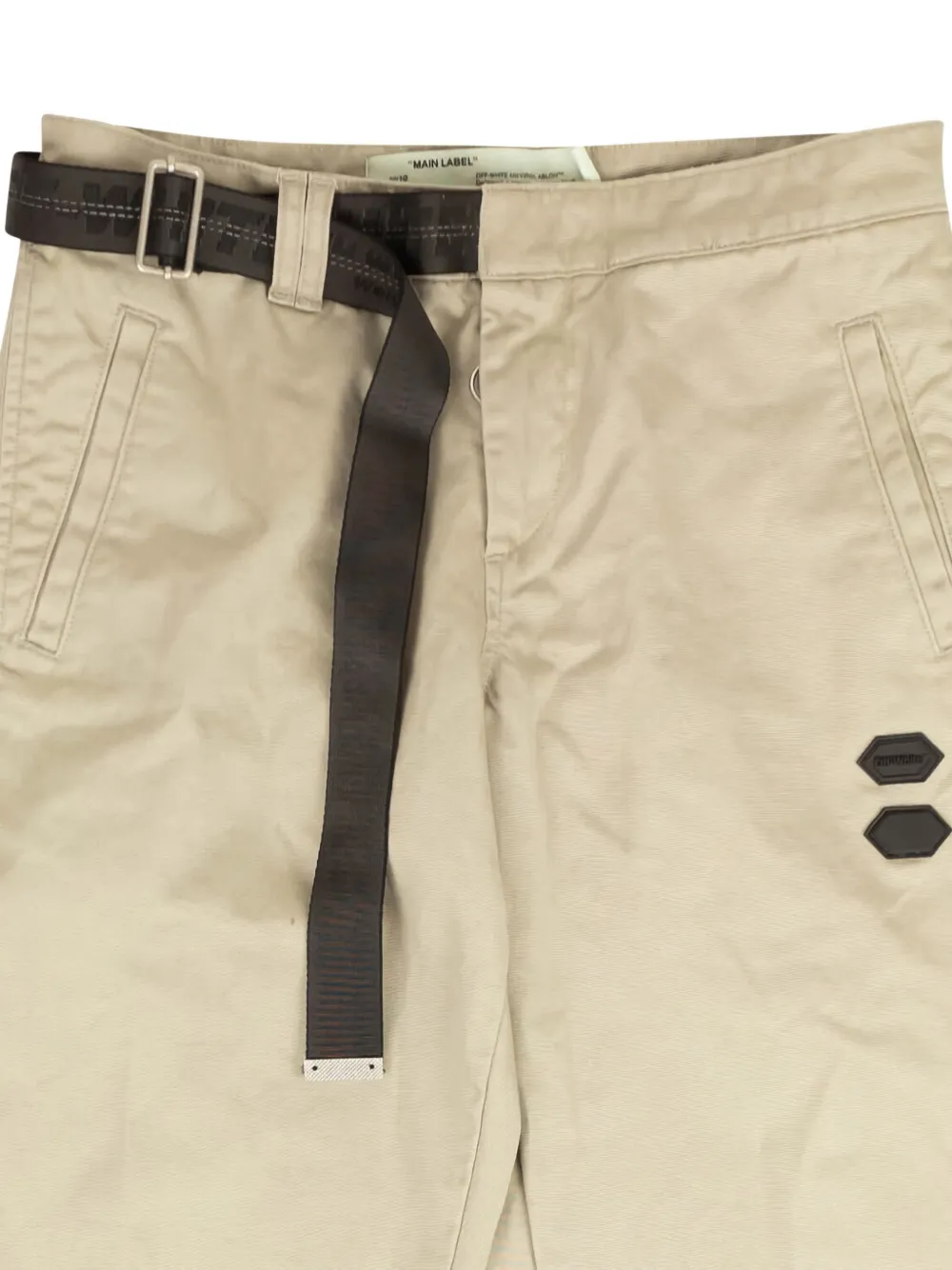 Off-White Jeans met toelopende pijpen en ceintuur Beige