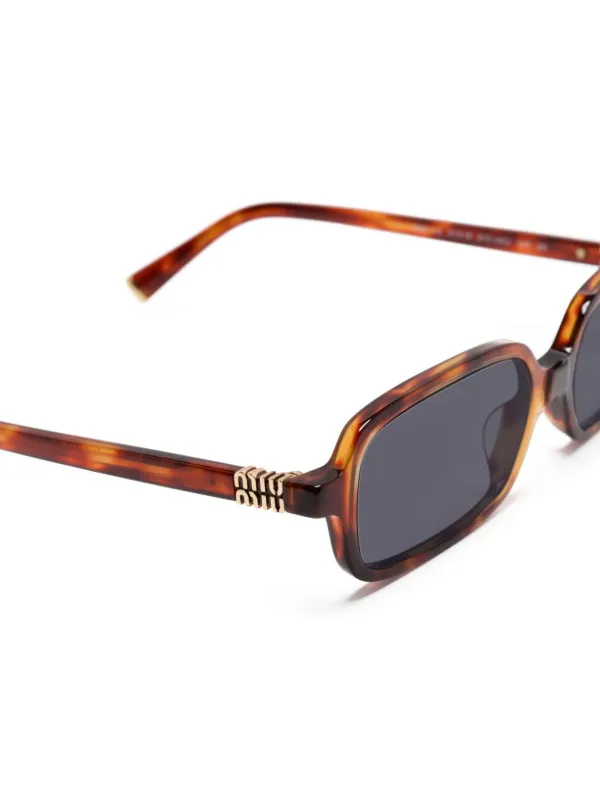 Miu Miu Eyewear 11ZS サングラス | ブラウン | FARFETCH JP