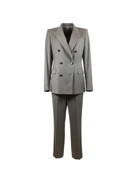 Tagliatore traje con doble botonadura
