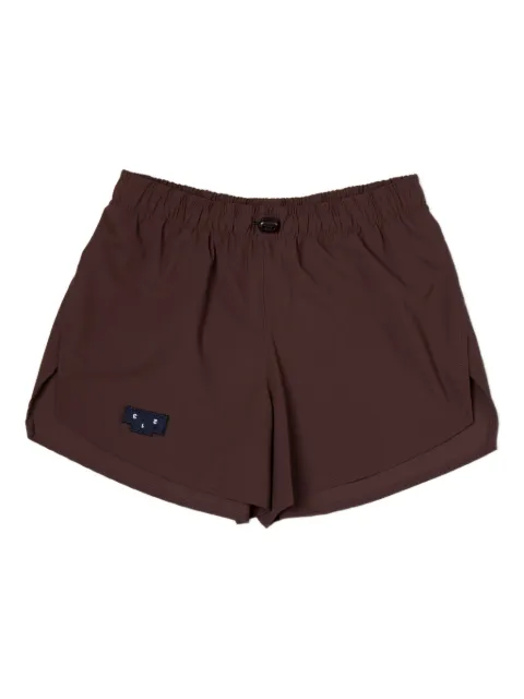 UNNA logo-patch elastic-waist shorts