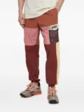 Columbia Peak patchwork panelled trousers - Orange