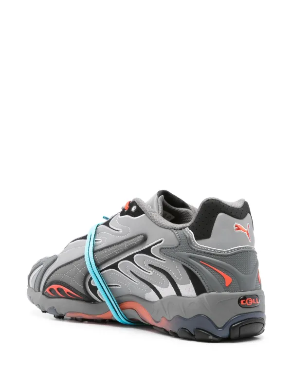 grey and orange puma shoes