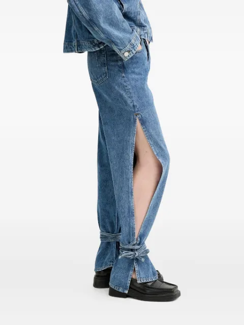 Won Hundred side-slit tied-cuffs denim jeans