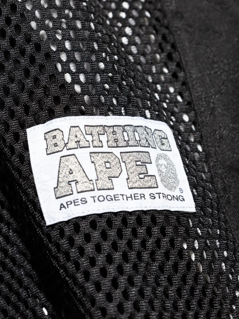 A BATHING APE Jersey top met mesh vlakken en lange mouwen Zwart