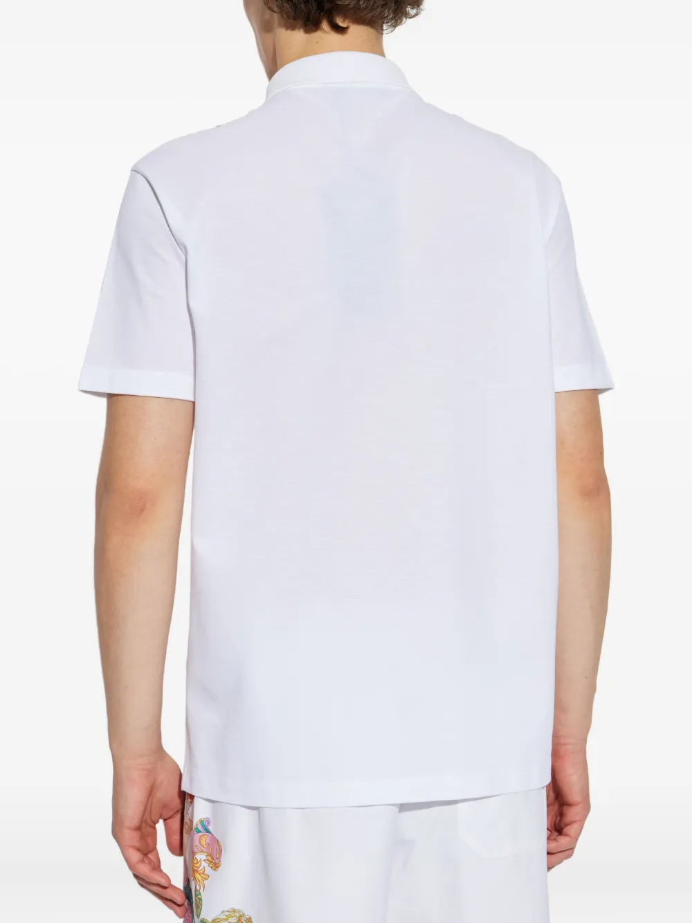 Versace Poloshirt met grafische print Wit