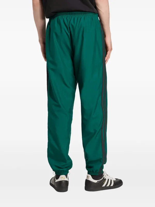 adidas ダークグリーン トラックパンツ adidas アディダス オリジナルス トラックパンツ ジェンダー