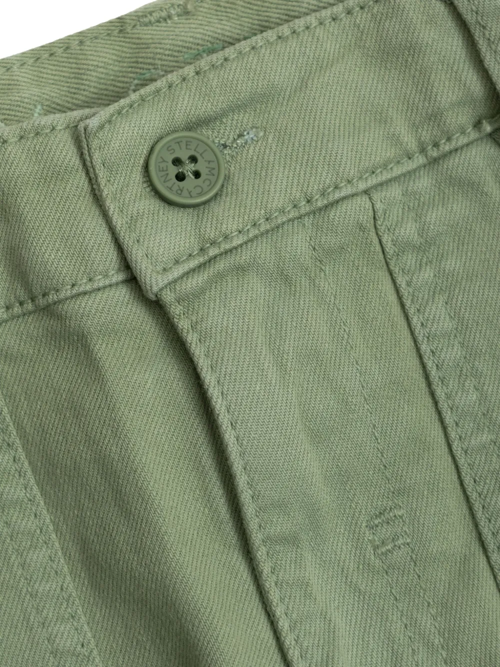 Stella McCartney Kids cartoon-patch utility trousers Groen