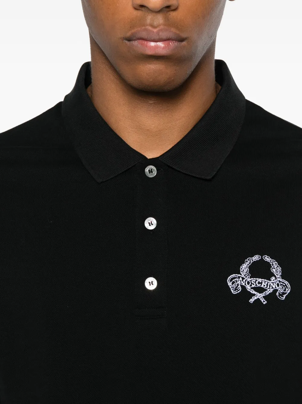 Moschino logo-embroidered polo shirt Zwart