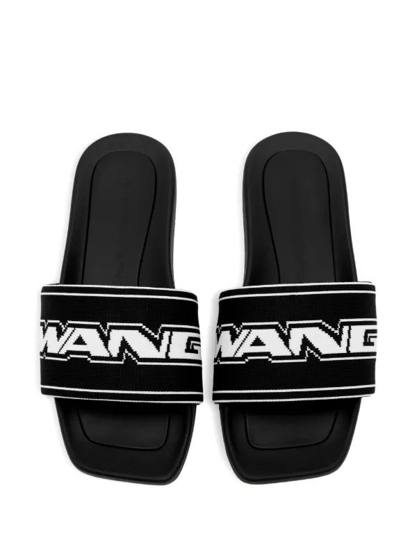 Alexander Wang ロゴストラップ スリッポン スライド Alexander Wang logo-strap Slides | Black | FARFETCH JO