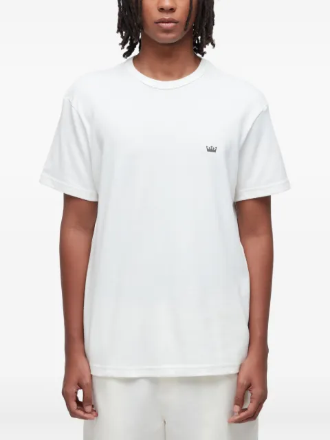 Osklen playera con detalle de corona