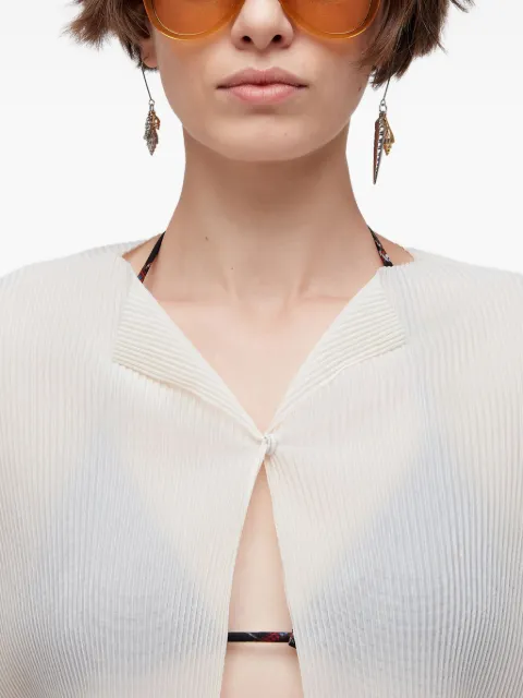 Osklen aretes con dije de concha de mar