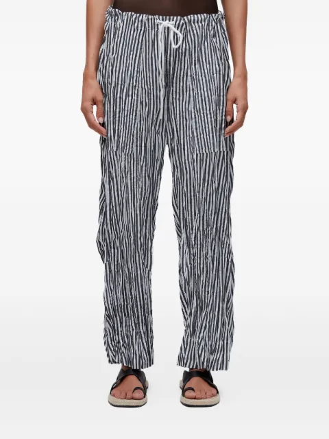 Osklen stripe-pleated trousers