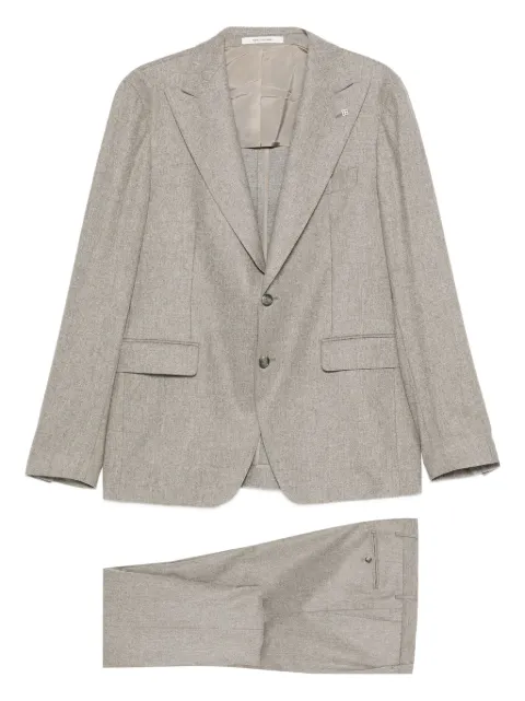 Tagliatore traje con botones