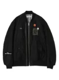 Undercover embroidered-patch quilted bomber jacket - Black