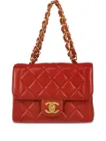 CHANEL Pre-Owned 1995 mini Classic Flap cross body bag - Red