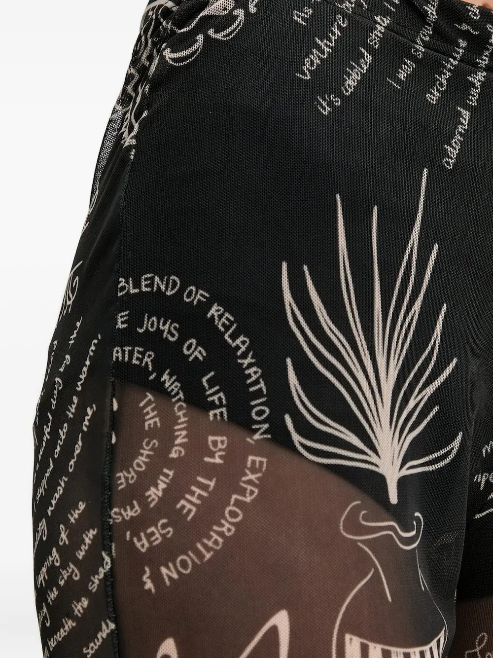 NEVER FULLY DRESSED Flared broek met print Zwart