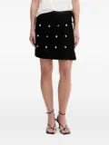 NEVER FULLY DRESSED crochet-detail wrap mini skirt - Black