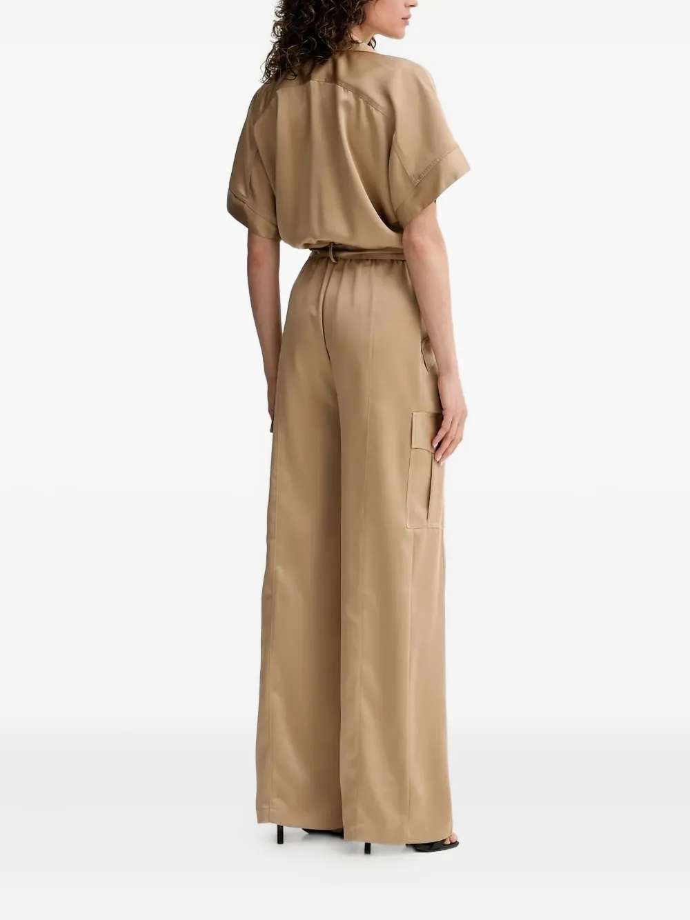 SIMONA CORSELLINI Jumpsuit met ceintuur - Beige