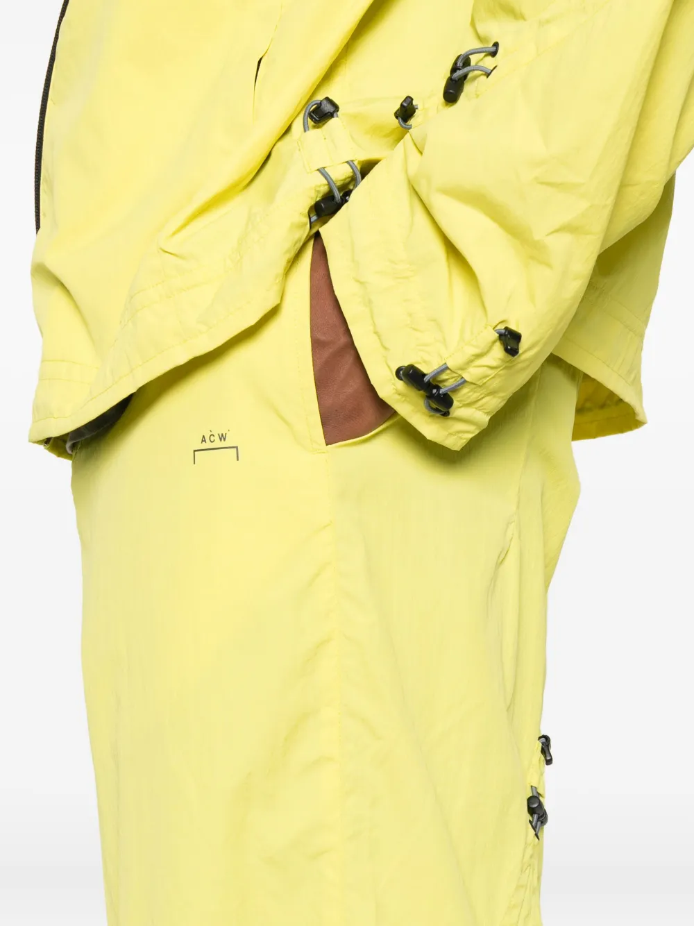 A-COLD-WALL* clasp-fastening detail trousers Geel