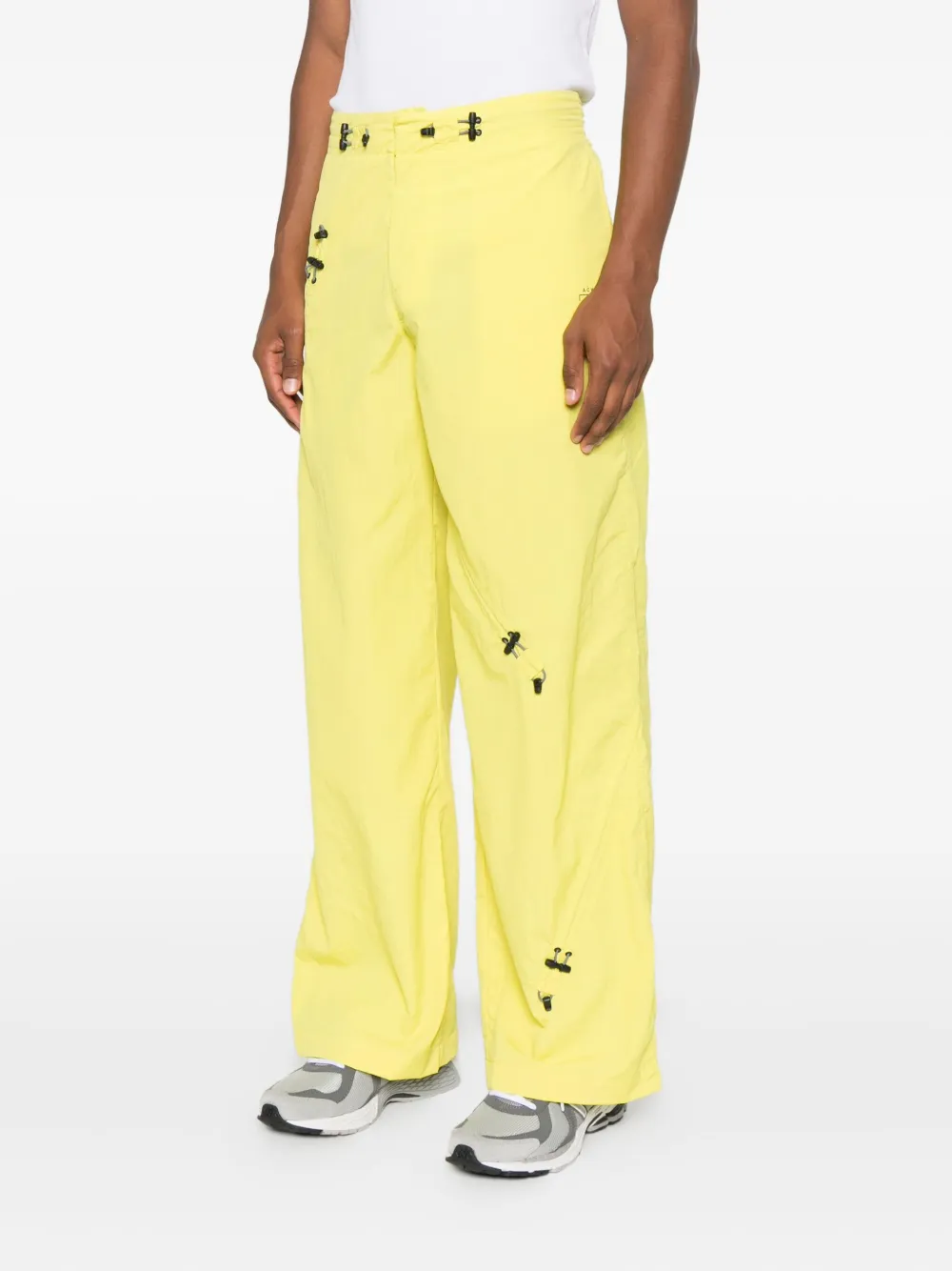 A-COLD-WALL* clasp-fastening detail trousers Geel