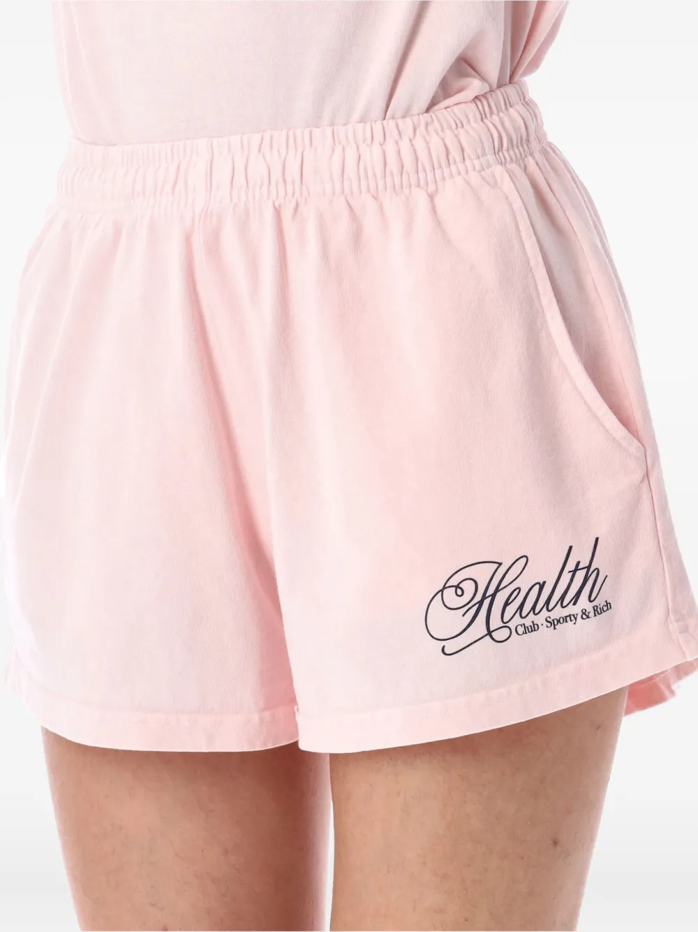 Sporty & Rich Health Script Disco shorts Roze