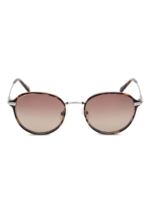 GUESS EYEWEAR lentes de sol con armazón redonda estilo carey
