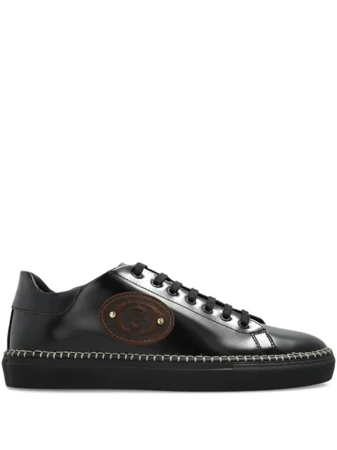 Moschino logo-embossed trainers