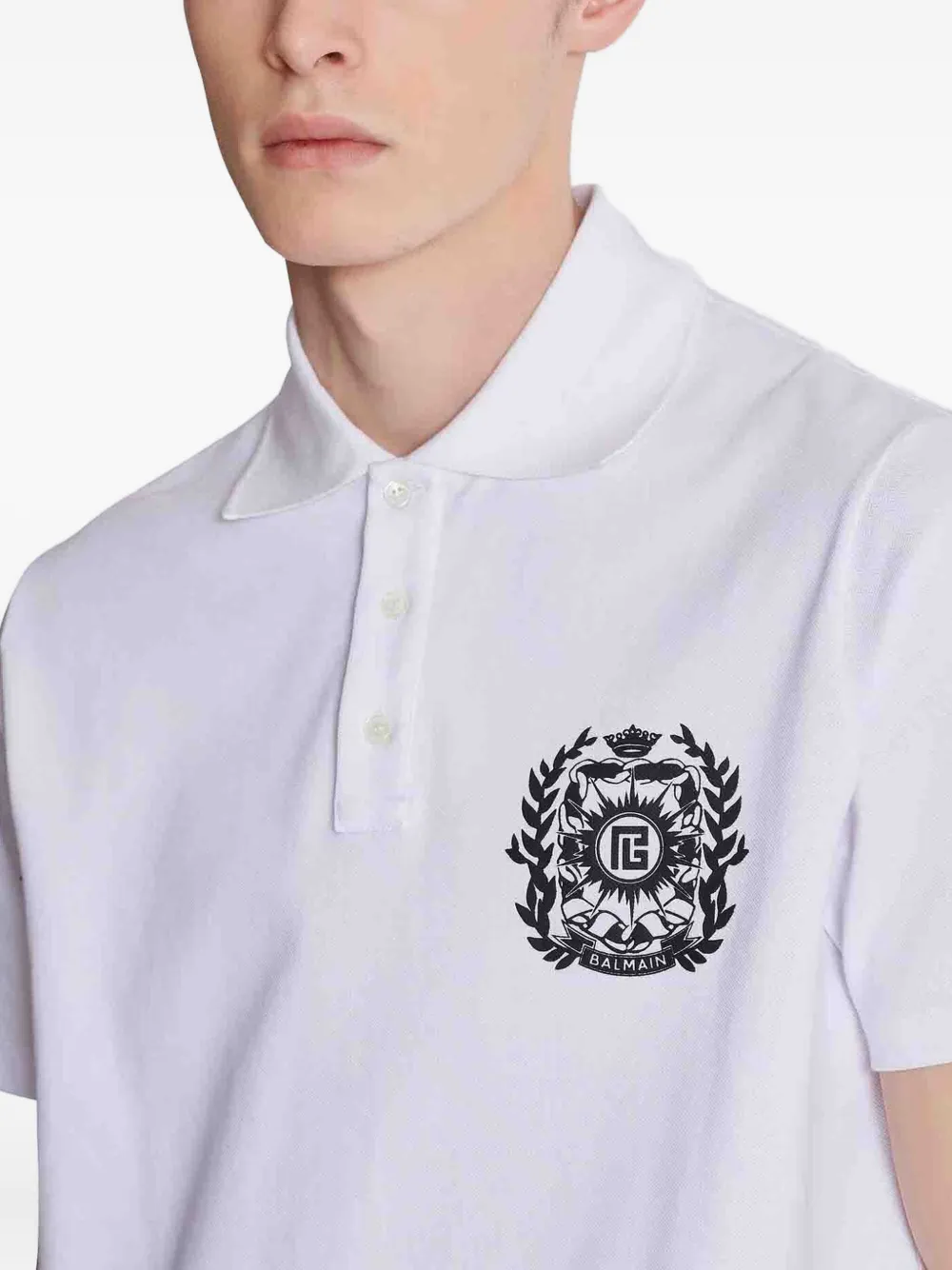 Balmain crest-embellished polo shirt Wit