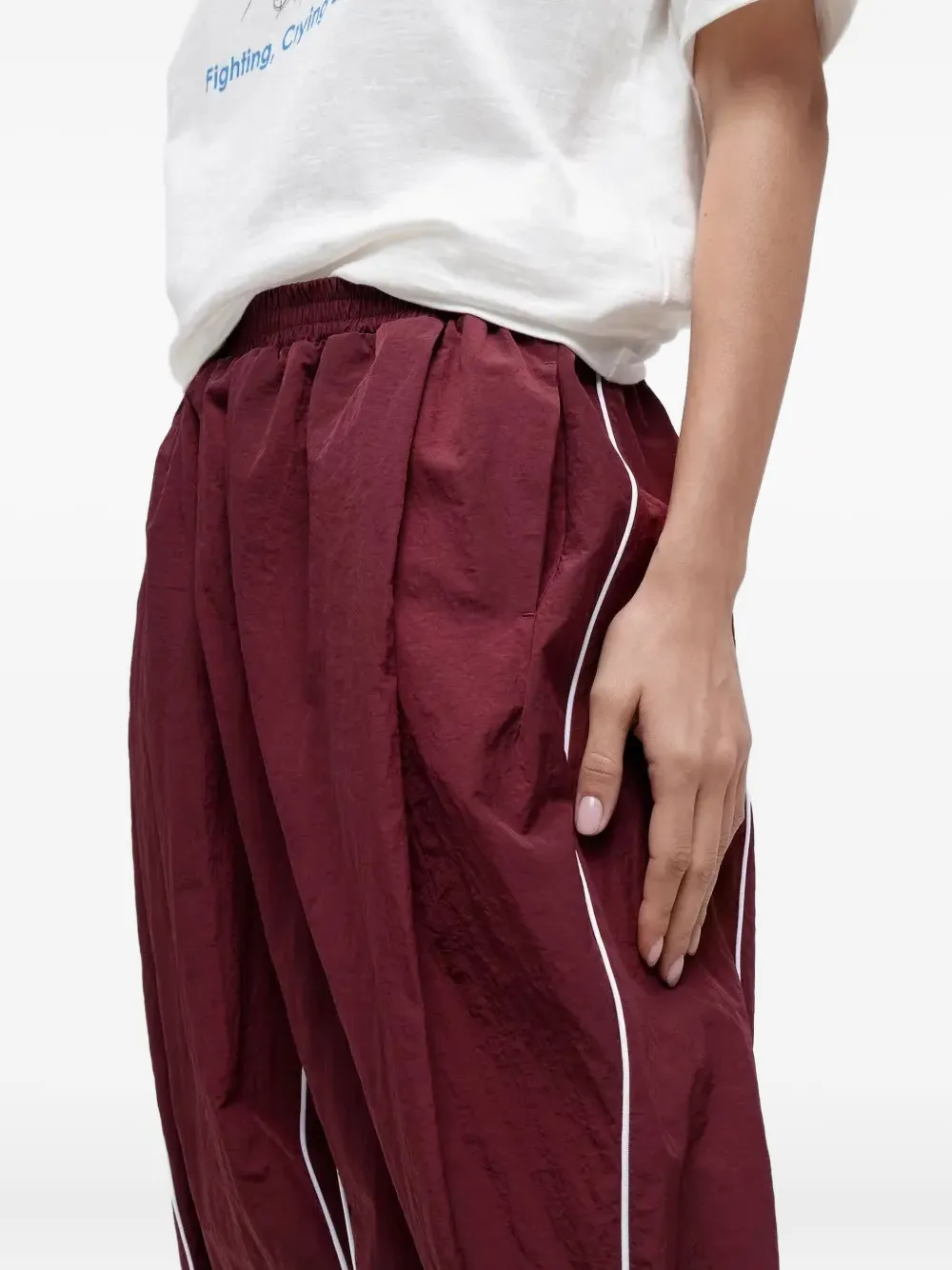 Pushbutton Pleated Piped Track Pants In Burgundy