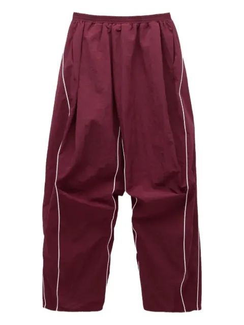 pushBUTTON pleated piped track pants