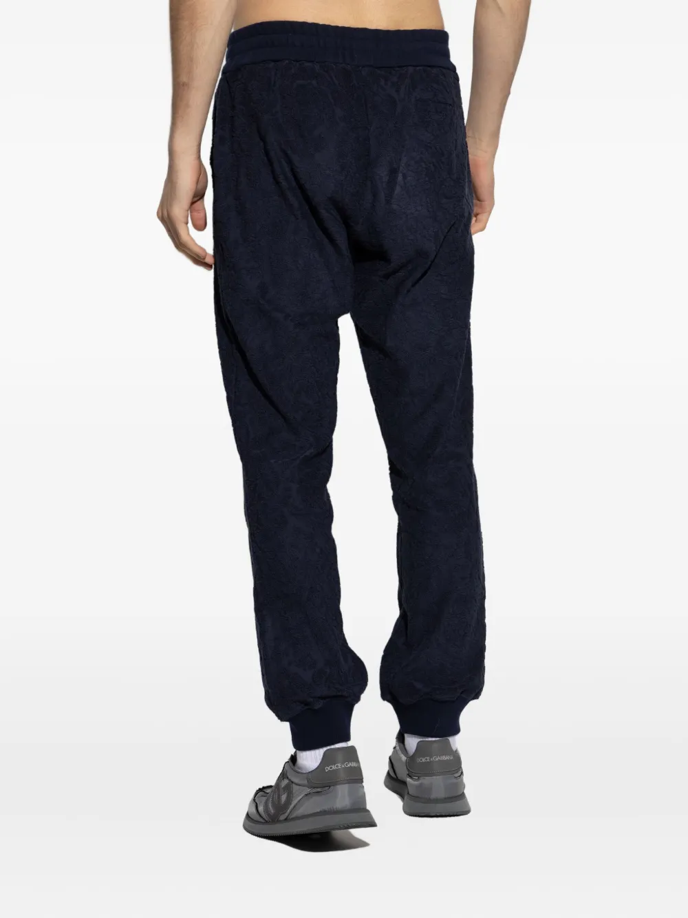 Versace textured-cuff trousers Blauw