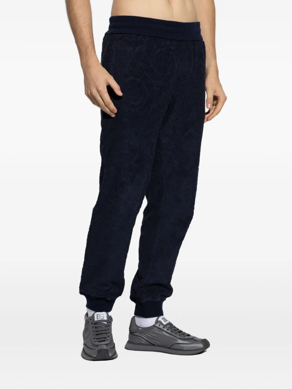 Versace textured-cuff trousers Blauw