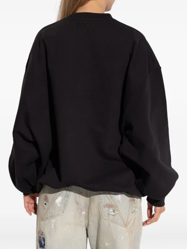 VETEMENTS プリント スウェットシャツ | ブラック | FARFETCH JP