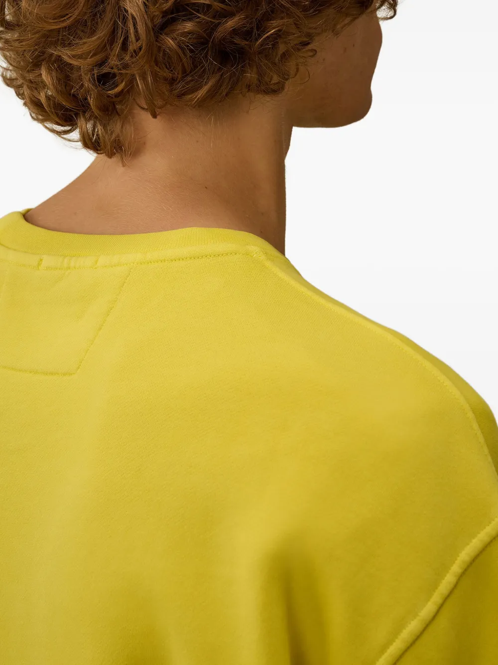C.P. Company Sweater met Lens-zak Geel