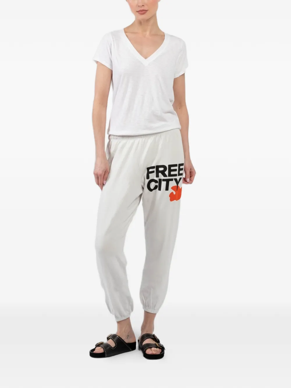 FreeCity logo-lettering track pants - Beige