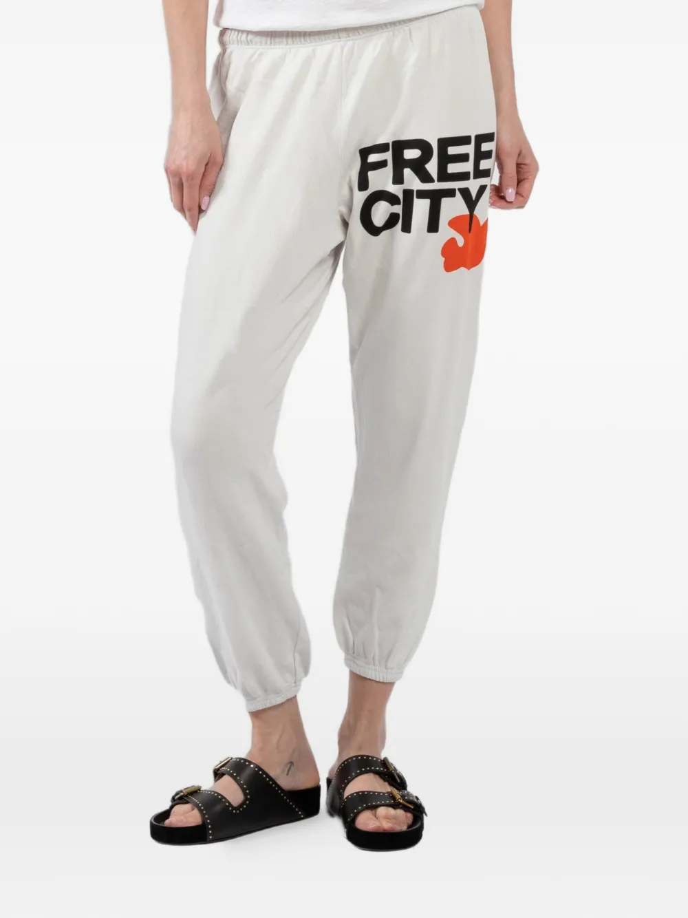 FreeCity logo-lettering track pants - Toni neutri