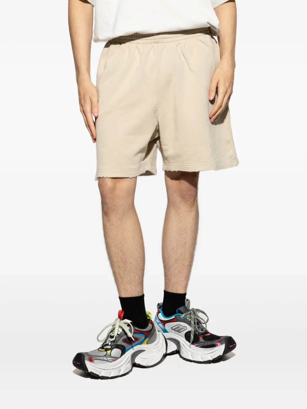 Balenciaga Bermuda shorts met geborduurd logo Beige