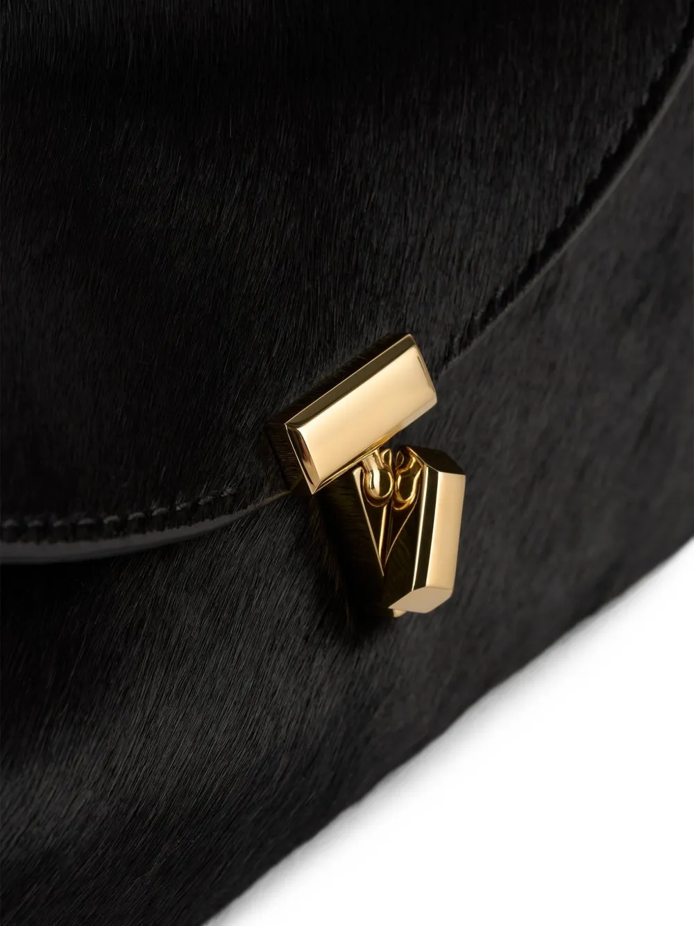 TOTEME T-lock clutch met ponyhaar Zwart