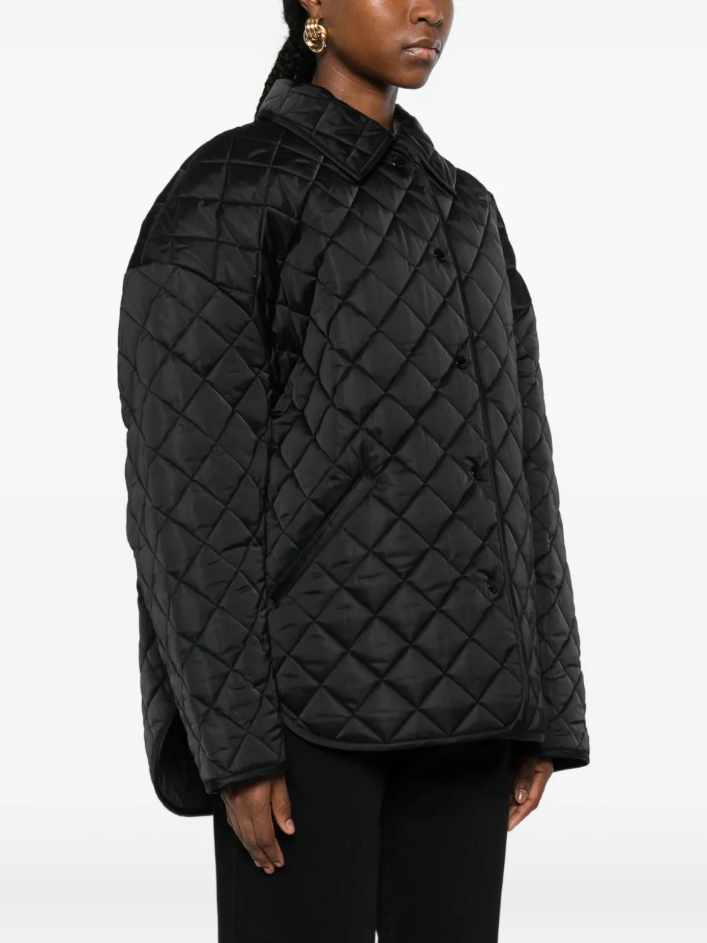 Totême Collared Quilted Jacket In Black
