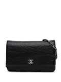 CHANEL Pre-Owned 2012 Lambskin Camellia Embossed Wallet On Chain crossbody bag - Black